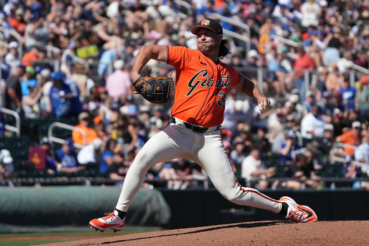 Feb 27, 2026; Scottsdale, Arizona, USA; San Francisco Giants pitcher Robbie Ray (38) throws against the Los Angeles Dodgers in the first inning at Scottsdale Stadium. Mandatory Credit: Rick Scuteri-Imagn...