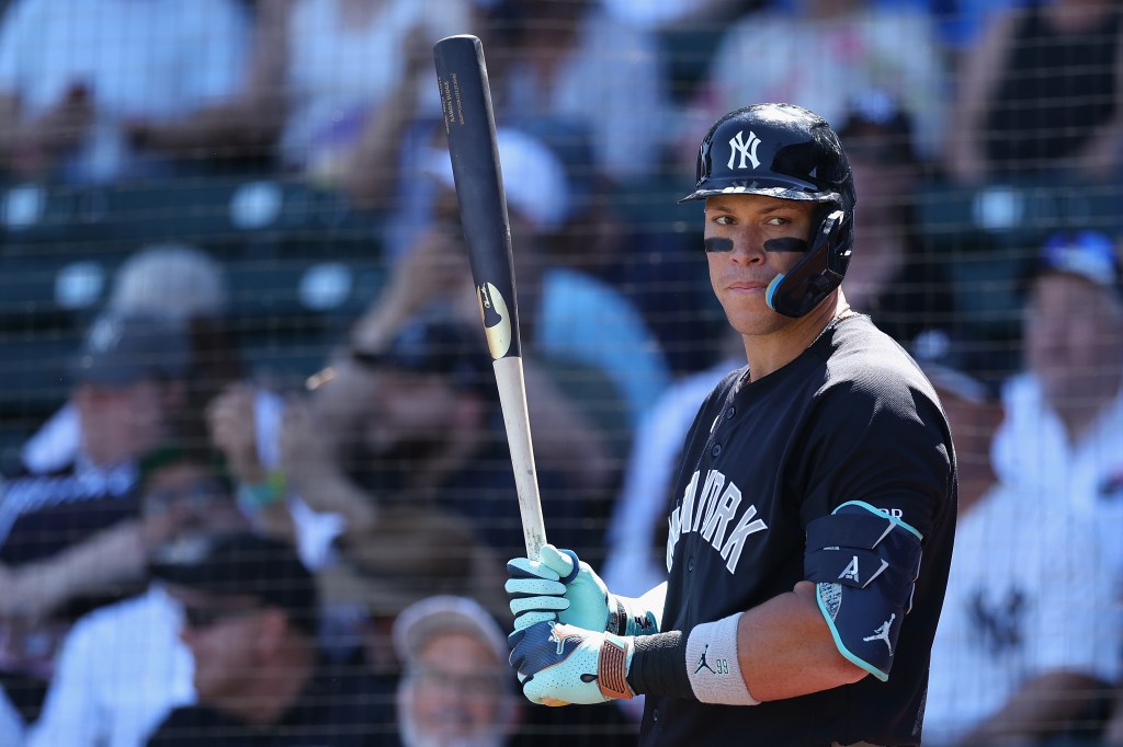 Aaron Judge of the New York Yankees warming up on deck.