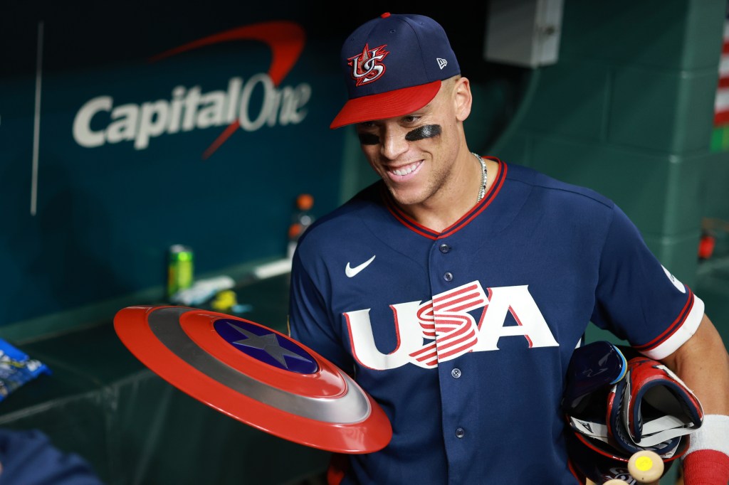 Team USA Captain Aaron Judge with shield