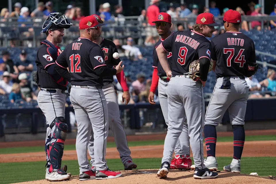 Feb 26, 2026; Peoria, Arizona, USA; Cleveland Guardians manager Stephen Vogt (12) visits the mound against the Seattle Mariners in the first inning at Peoria Sports Complex. Mandatory Credit: Rick Scuteri-Imagn Images