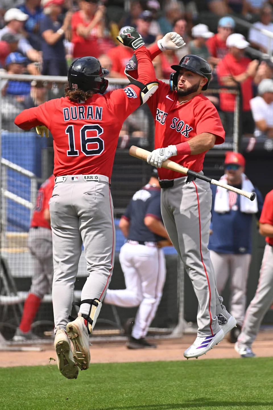 Feb 27, 2026; North Port, Florida, USA; Boston Red Sox right fielder Jarren Duran (16) celebrates with designated hitter Wilyer Abreu (52) after hitting a solo home run in the first inning against the Atlanta Braves during spring training at CoolToday Park. (Jonathan Dyer/Imagn Images)
