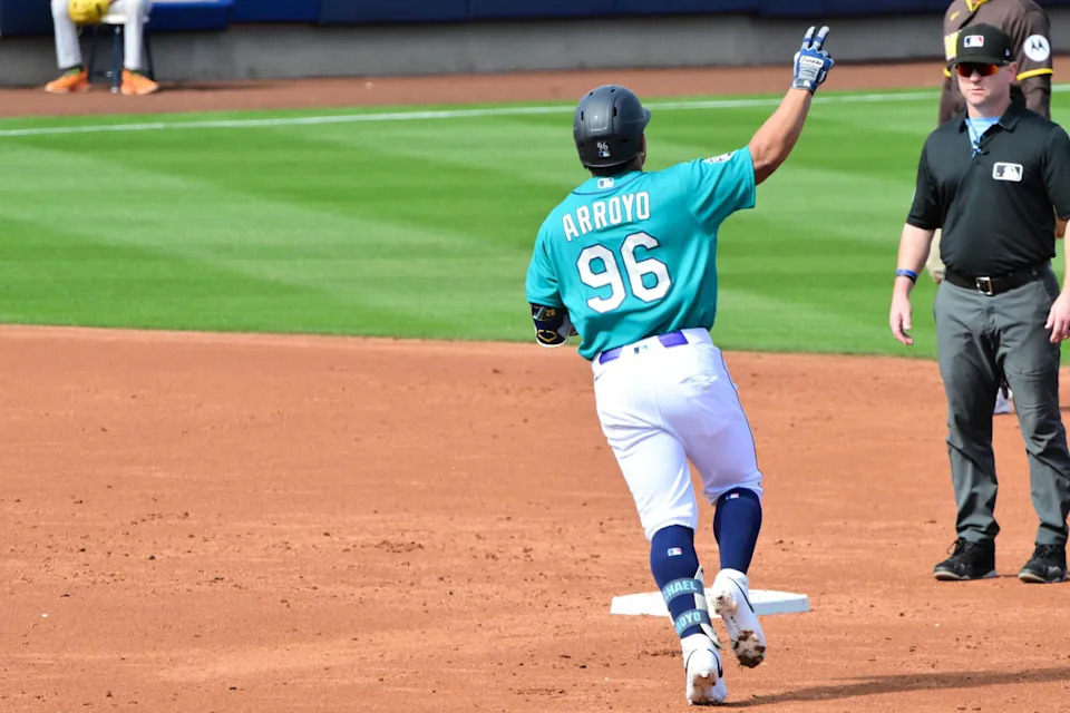 Seattle Mariners shortstop Michael Arroyo (96) hits a two run home run in the second inning against the San Diego Padres during a Spring Training game at Peoria Sports Complex. Matt Kartozian-Imagn Images