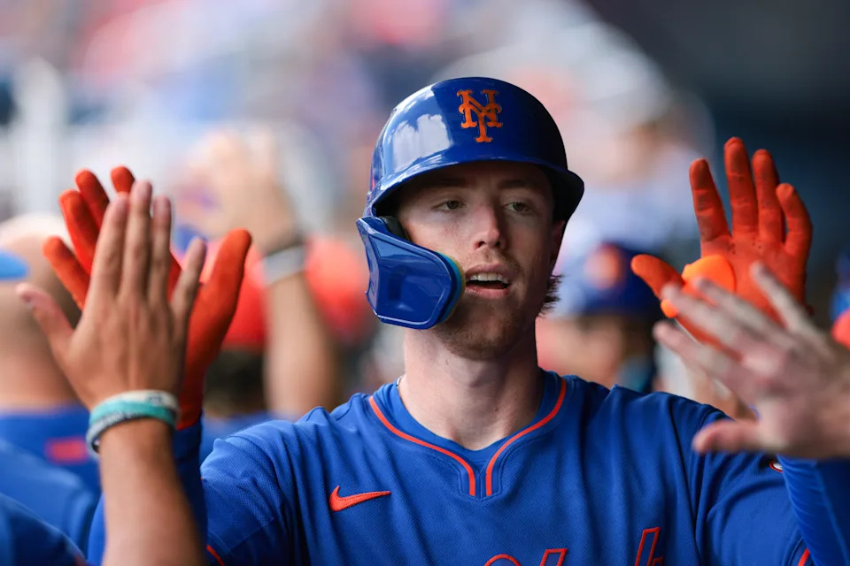 New York Mets right fielder Brett Baty (7) celebrates with teammates after hitting a two-run home run against the Washington Nationals during the first inning at CACTI Park of the Palm Beaches on March 5, 2026, in West Palm Beach, Florida.