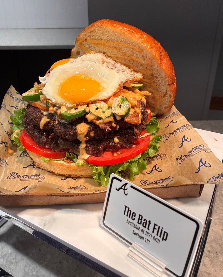 The Bat Flip features two pounds of beef with braised short ribs, jalapenos, and two fried eggs. (Photo by Cathy Cobbs)