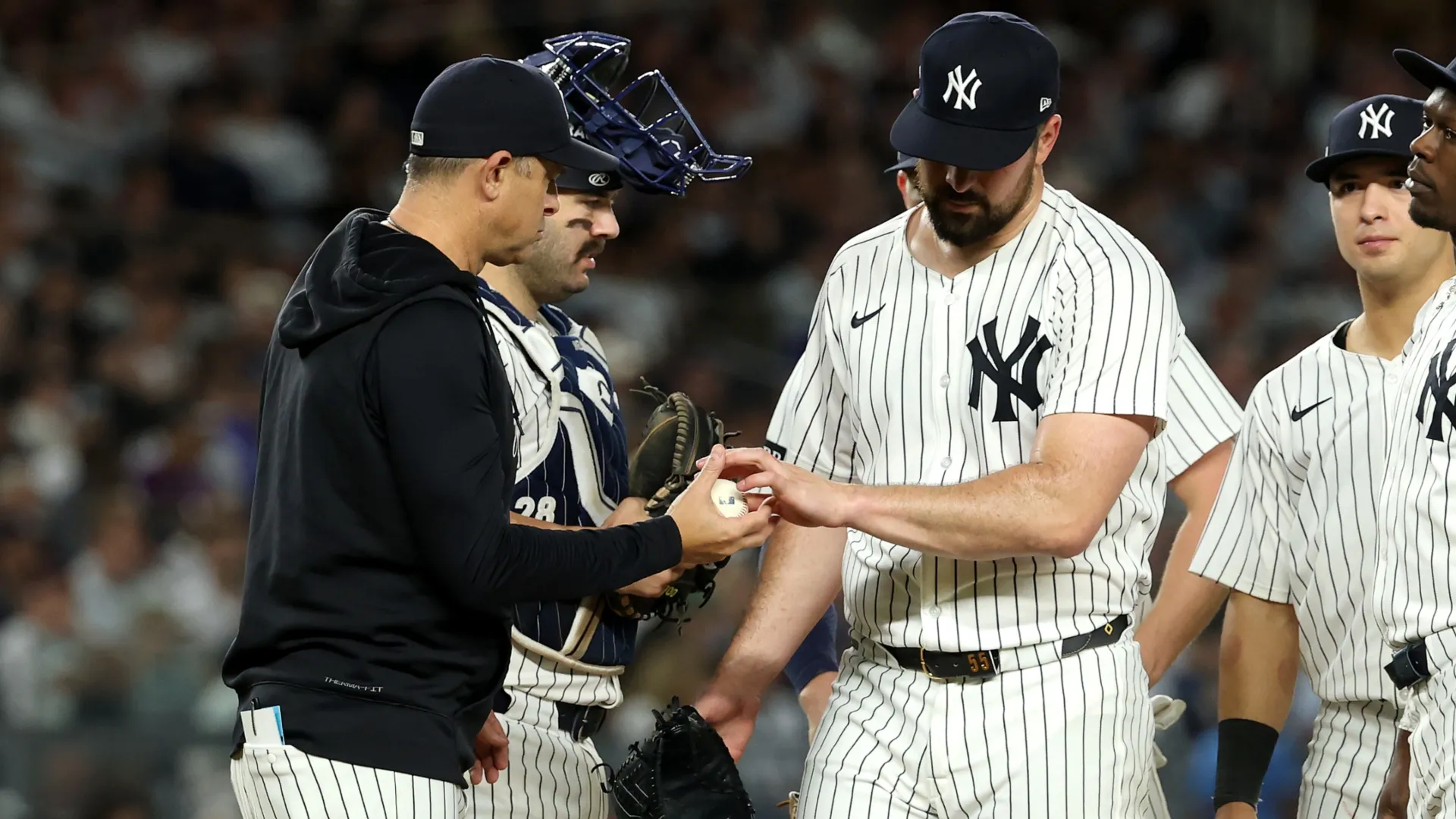 Carlos Rodon #55 of the Yankees reacts on the mound as he is taken out of the game by Manager Aaron Boone. Al Bello/Getty Images