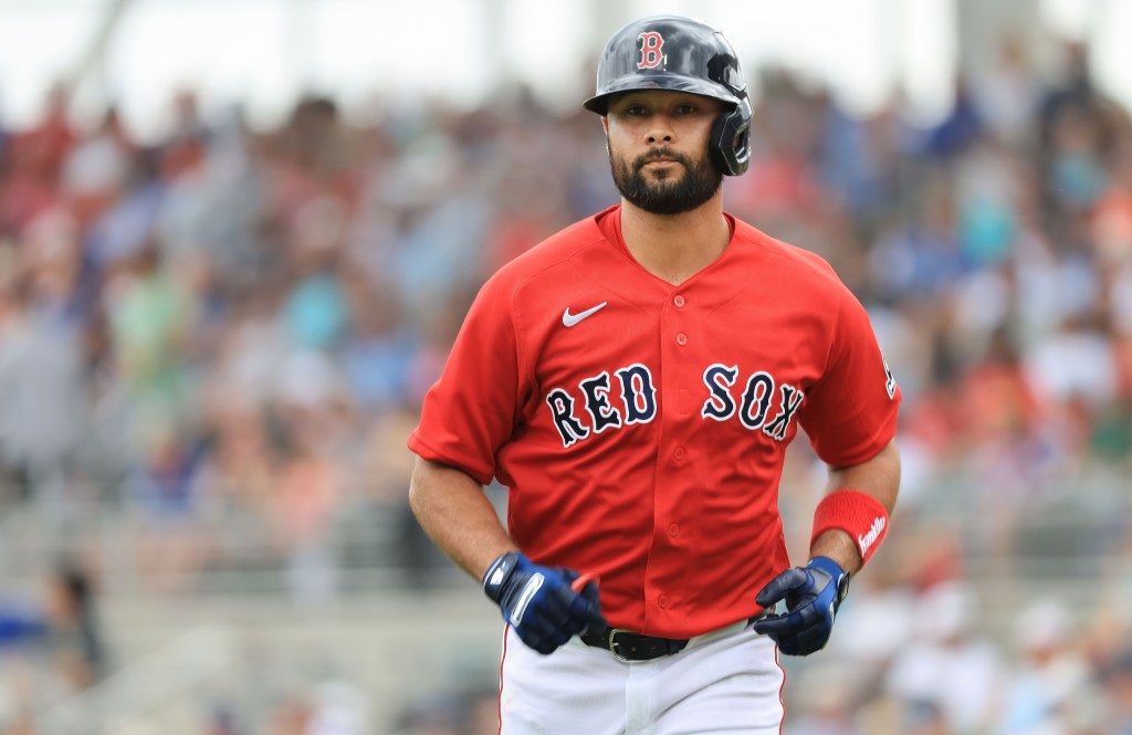 Boston Red Sox infielder Isiah Kiner-Falefa in his red uniform and batting helmet.