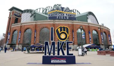 Fans arrive before an opening-day baseball game between the Milwaukee Brewers and the Chicago White Sox, Thursday, March 26, 2026, in Milwaukee.