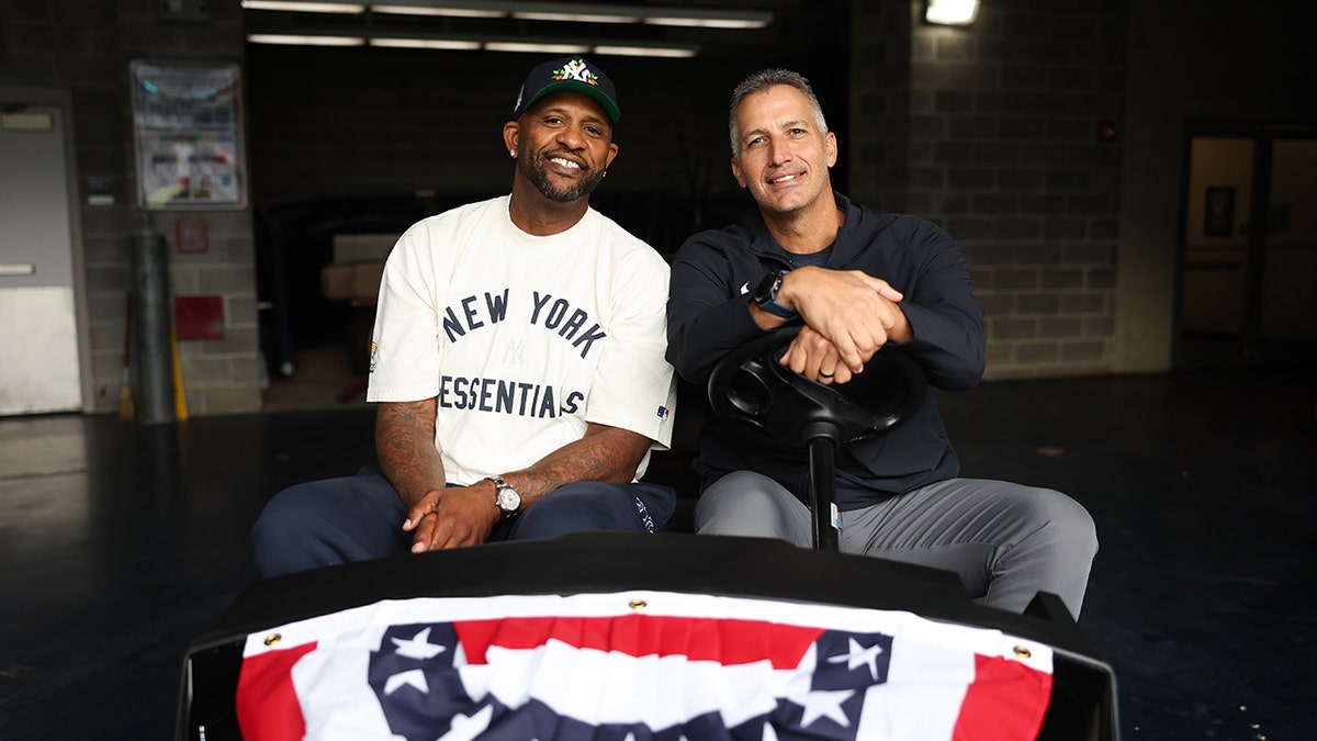 CC Sabathia and Andy Pettitte smiles for photo