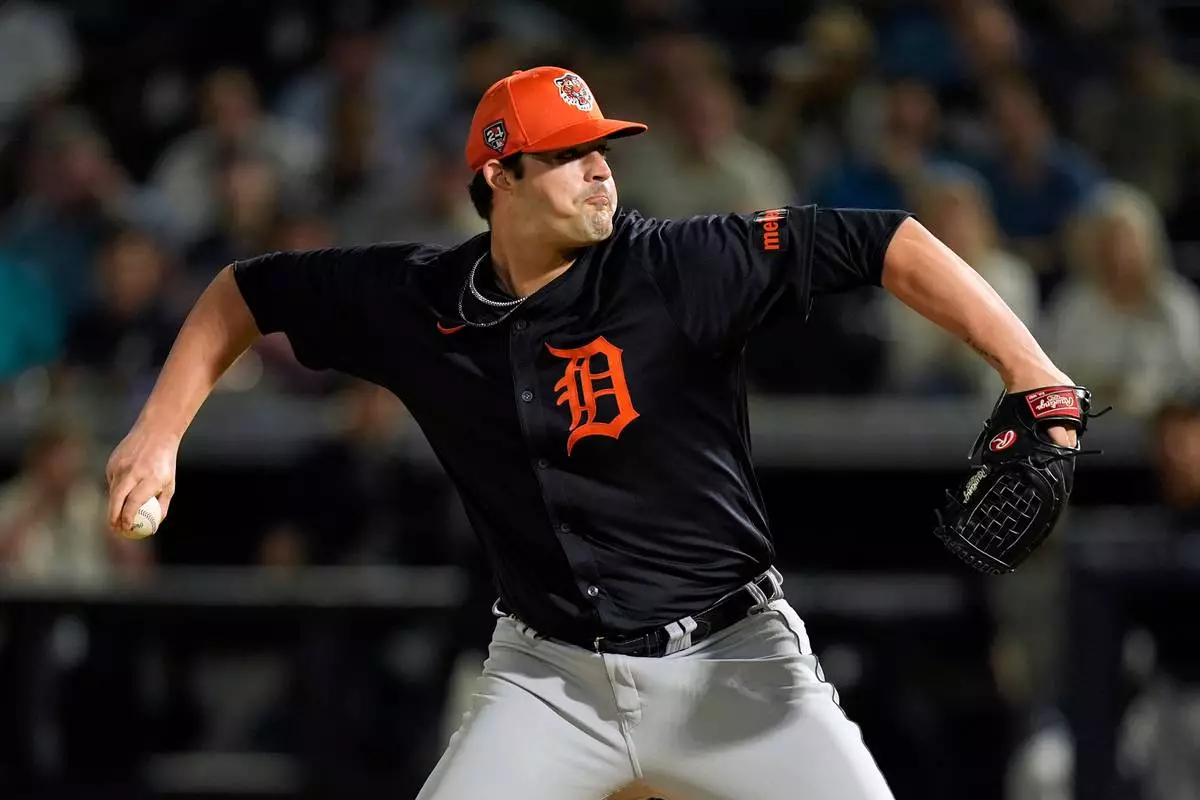 FILE - Detroit Tigers pitcher RJ Petit throws during the first inning of a spring training baseball game against the New York Yankees, March 7, 2024, in Tampa, Fla. (AP Photo/Charlie Neibergall, File)