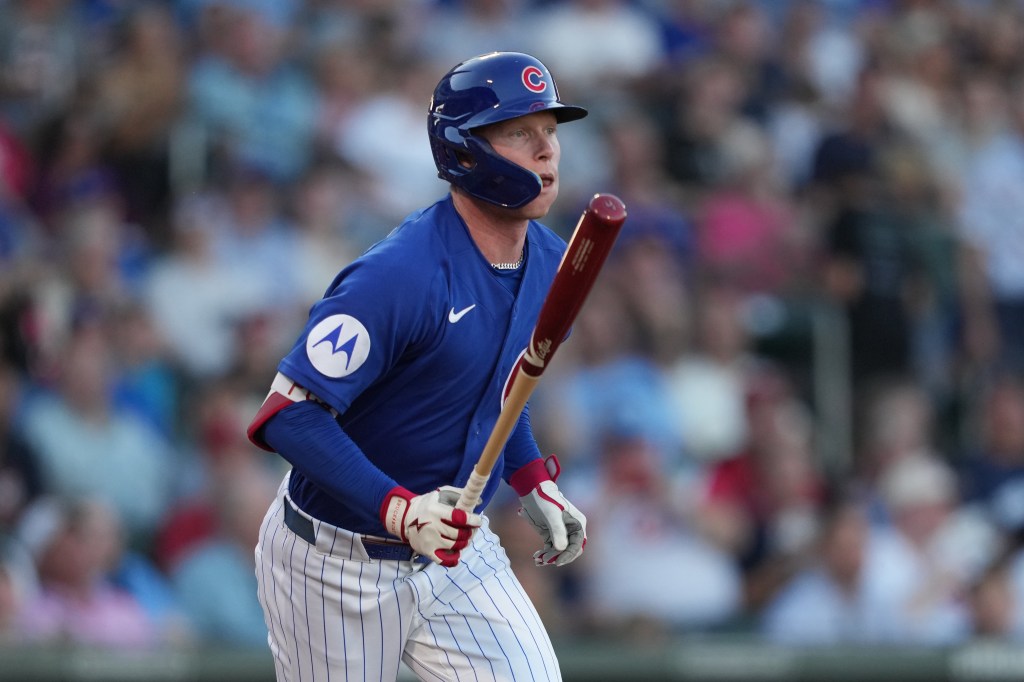 Chicago Cubs center fielder Pete Crow-Armstrong (4) hits against the Cincinnati Reds in the first inning at Sloan Park. 