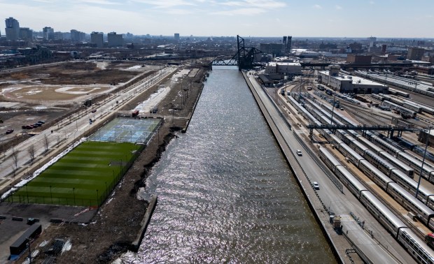 Amtrak's 14th Street Coach Yard, right, operates on March 18, 2026, along the South Branch of the Chicago River south of Roosevelt Road, across from The 78 development. (Brian Cassella/Chicago Tribune)