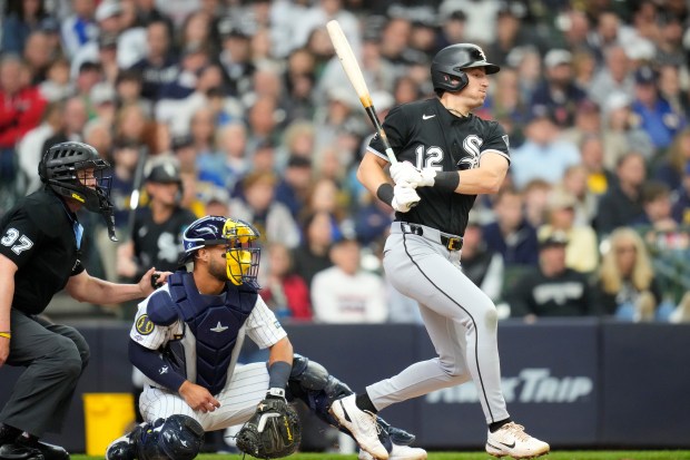 Colson Montgomery #12 of the Chicago White Sox singles in a run in the second inning as Jeferson Quero #15 of the Milwaukee Brewers looks on at American Family Field on March 29, 2026 in Milwaukee, Wisconsin. (Photo by John Fisher/Getty Images)