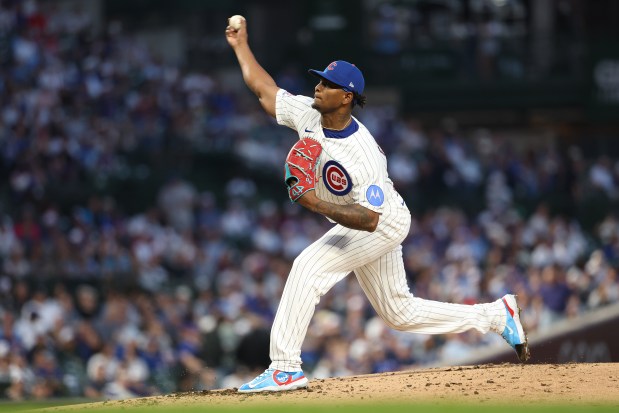 Chicago Cubs' Edward Cabrera, wearing custom cleats, delivers a pitch against the Los Angeles Angels at Wrigley Field on March 30, 2026, in Chicago. (Michael Reaves/Getty Images)