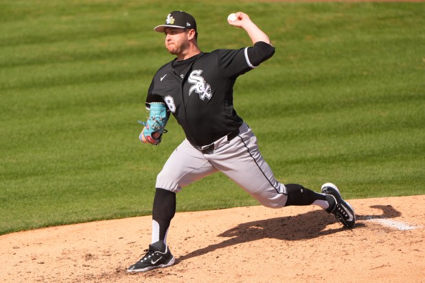 Chicago White Sox starting pitcher Anthony Kay throws during the second inning of a spring training baseball game Tuesday, Feb. 24, 2026, in Peoria, Ariz. (AP Photo/Charlie Riedel)