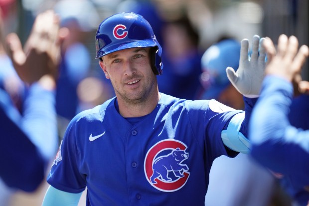 Chicago Cubs' Alex Bregman smiles as he celebrates his home run against the New York Yankees during the third inning of a spring training baseball game, Monday, March 23, 2026, in Mesa, Ariz. (AP Photo/Ross D. Franklin)