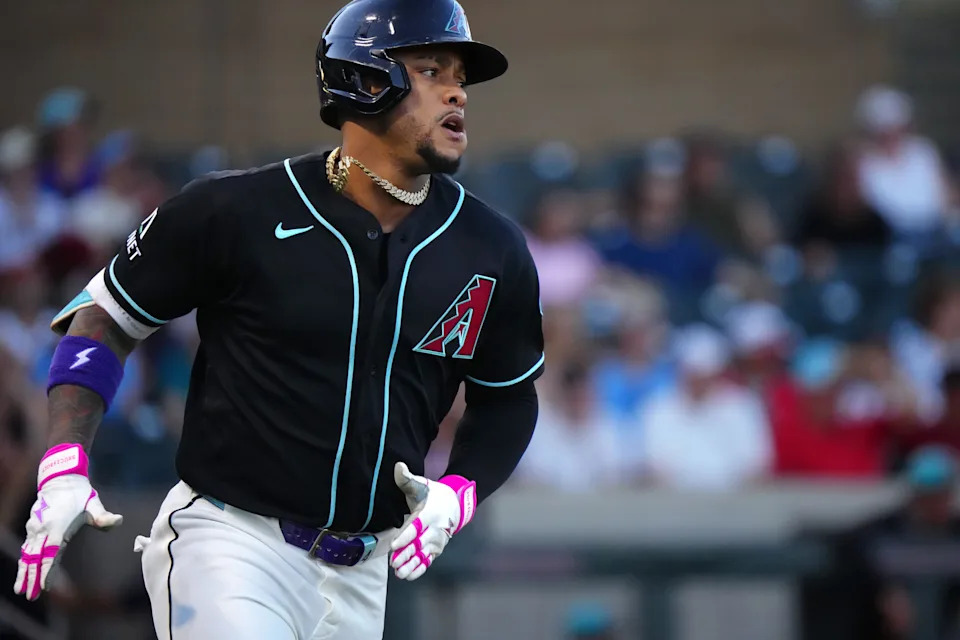 Diamondbacks second baseman Ketel Marte (4) runs to first against the Brewers during a spring training game at Salt River Fields on March 20, 2026.