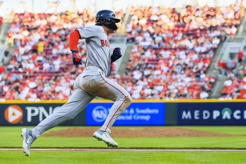 Mar 26, 2026; Cincinnati, Ohio, USA; Boston Red Sox left fielder Roman Anthony (19) scores on a RBI single hit by designated hitter Jarren Duran (not pictured) in the ninth inning against the Cincinnati Reds at Great American Ball Park. (Katie Stratman/Imagn Images)