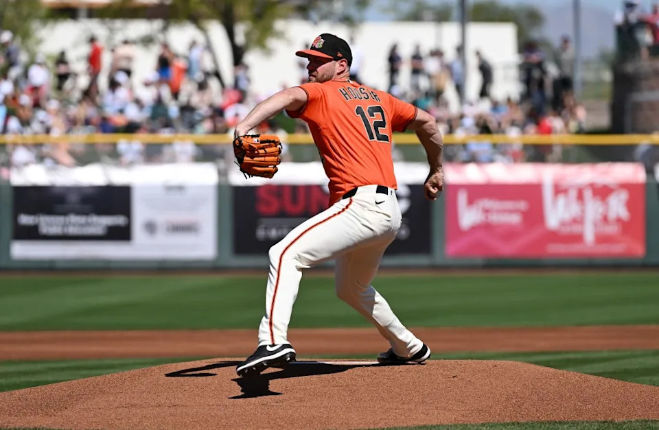 Adrian Houser of the San Francisco Giants delivers a first inning pitch against the United States National Team during an exhibition game. Getty Images