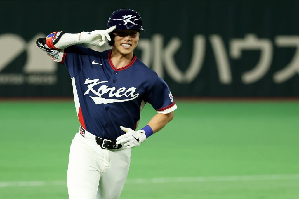 Team South Korea’s Hyeseong Kim celebrates after hitting a two-run home run against Team Japan. Getty Images