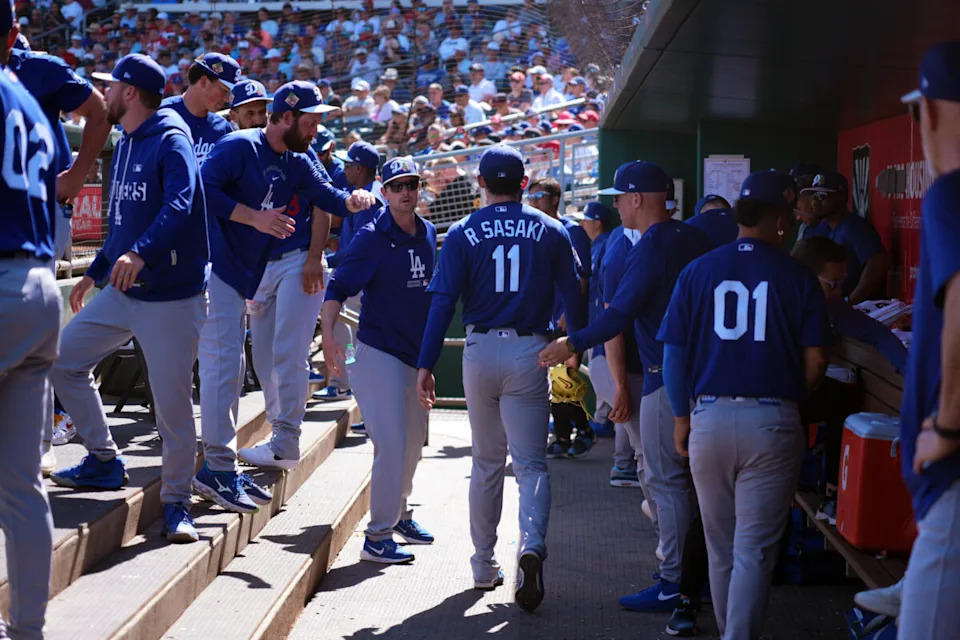 Mar 3, 2026; Goodyear, Arizona, USA; Los Angeles Dodgers starting pitcher Roki Sasaki (11) leaves the game against the Cleveland Guardians during the first inning at Goodyear Ballpark. Mandatory Credit: Joe Camporeale-Imagn Images