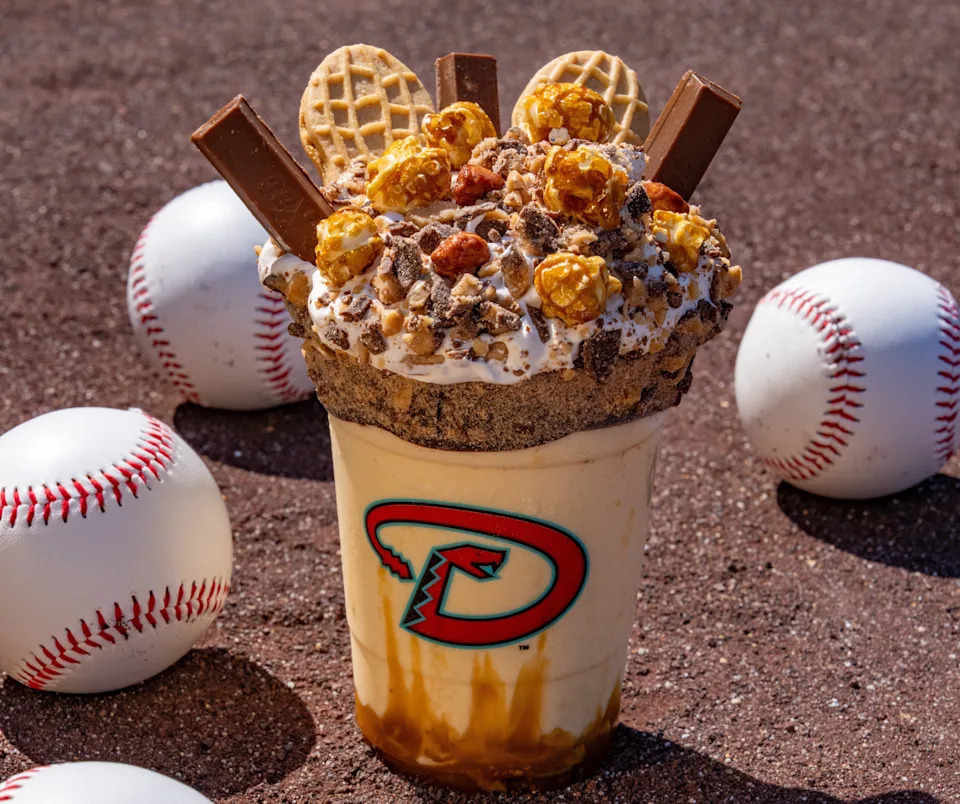 The "Take Me Out to the Ballgame Milkshake" at Diamondbacks home games is a salted caramel shake with whipped cream, peanut butter sandwich cookies, Kit Kat bars and Cracker Jack.