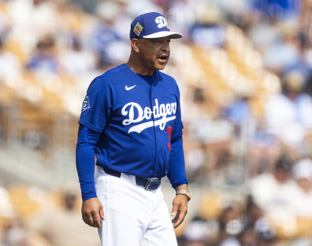 Mar 1, 2026; Phoenix, Arizona, USA; Los Angeles Dodgers manager Dave Roberts against the Los Angeles Angels during a spring training game at Camelback Ranch-Glendale. Mandatory Credit: Mark J. Rebilas-Imagn Images