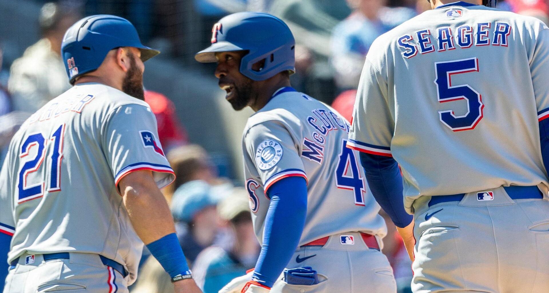 MacKenzie Gore strikes out 7 in his 1st start for Texas as the Rangers beat the Phillies 8-3