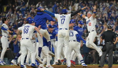 Oct 27, 2025; Los Angeles, California, USA; The Los Angeles Dodgers celebrate after first baseman Freddie Freeman (5) hit a walk off home run against the Toronto Blue Jays in the eighteenth inning during game three of the 2025 MLB World Series at Dodger Stadium. Mandatory Credit: Jayne Kamin-Oncea-Imagn Images
