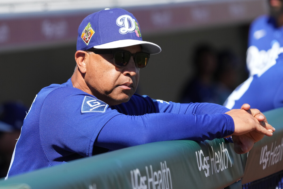 Feb 27, 2026; Scottsdale, Arizona, USA; Los Angeles Dodgers manager Dave Roberts (30) looks on before a game against the San Francisco Giants at Scottsdale Stadium. Mandatory Credit: Rick Scuteri-Imagn Images
