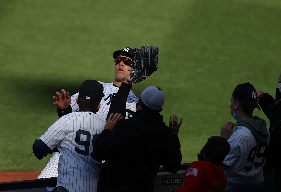 Aaron Judge #99 of the New York Yankees in action against the Toronto Blue Jays during Opening Day at Yankee Stadium on April 1, 2021.