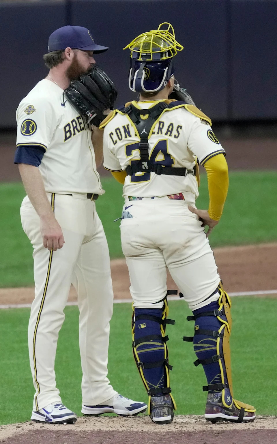 Milwaukee Brewers pitcher Brandon Woodruff (53) confers with catcher William Contreras during the sixth inning of their game against the Arizona Diamondbacks Monday, August 25, 2025 at American Family Field in Milwaukee, Wisconsin.