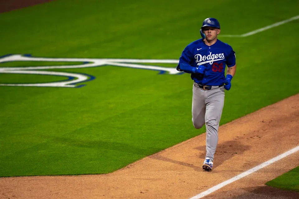 Los Angeles Dodgers catcher Dalton Rushing (68) runs the bases after hitting a homerun during an MLB spring training baseball game against the Kansas City Royals on March 17th, 2026 in Surprise, AZ.