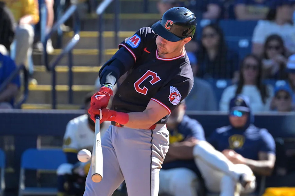 Feb 21, 2026; Phoenix, Arizona, USA; Cleveland Guardians right fielder Nolan Jones (22) hits a 3-run home run in the fifth inning against the Milwaukee Brewers at American Family Fields of Phoenix. Mandatory Credit: Jayne Kamin-Oncea-Imagn Images