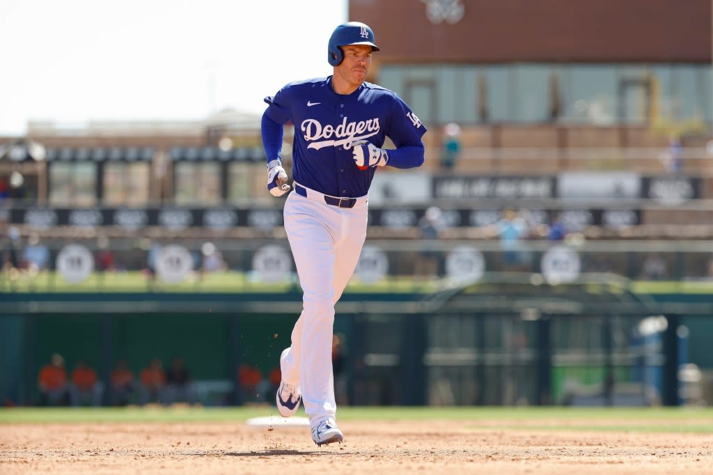 Freddie Freeman of the Los Angeles Dodgers rounds the bases on a solo home run in the third inning during a Spring Training game against the San Francisco Giants at Camelback Ranch on March 18, 2026 in Glendale, Arizona. (Photo by Brandon Sloter/Getty Images) Getty Images