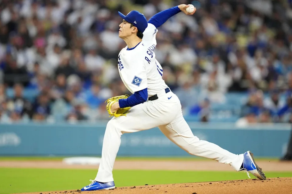 Mar 30, 2026; Los Angeles, California, USA; Los Angeles Dodgers pitcher Roki Sasaki (11) throws a pitch against the Cleveland Guardians in the first inning at Dodger Stadium. Mandatory Credit: Kirby Lee-Imagn Images