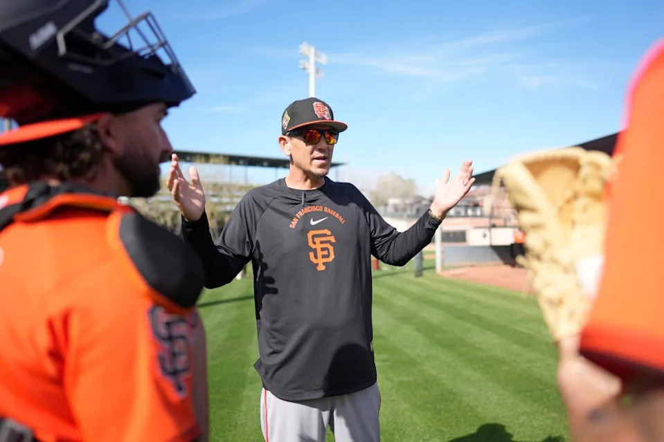 Pitching Coach Justin Meccage of the San Francisco Giants talks to players during Spring Training at Scottsdale Stadium. Getty Images