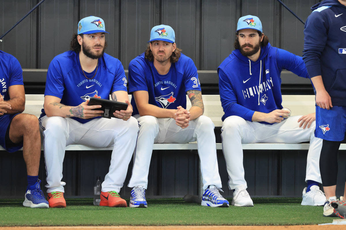 Blue Jays pitchers Cody Ponce (37), Kevin Gausman (34), and Dylan Cease (84).© Kim Klement Neitzel-Imagn Images