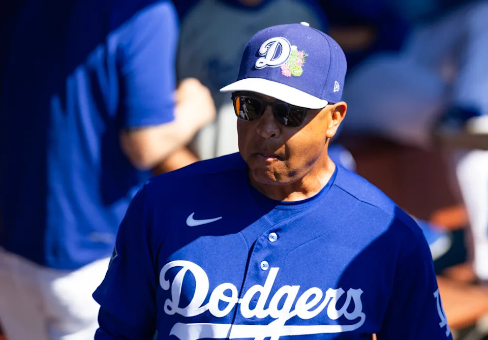 Mar 10, 2026; Phoenix, Arizona, USA; Los Angeles Dodgers manager Dave Roberts against the Arizona Diamondbacks during a spring training game at Camelback Ranch-Glendale. Mandatory Credit: Mark J. Rebilas-Imagn Images