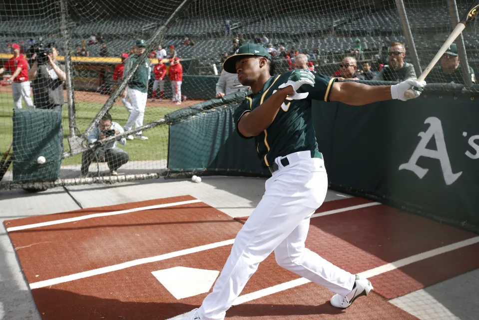 First round draft pick Kyler Murray of the Oakland Athletics takes batting practice after signing his contract at the Oakland Alameda Coliseum on June 15, 2018 in Oakland, California.
