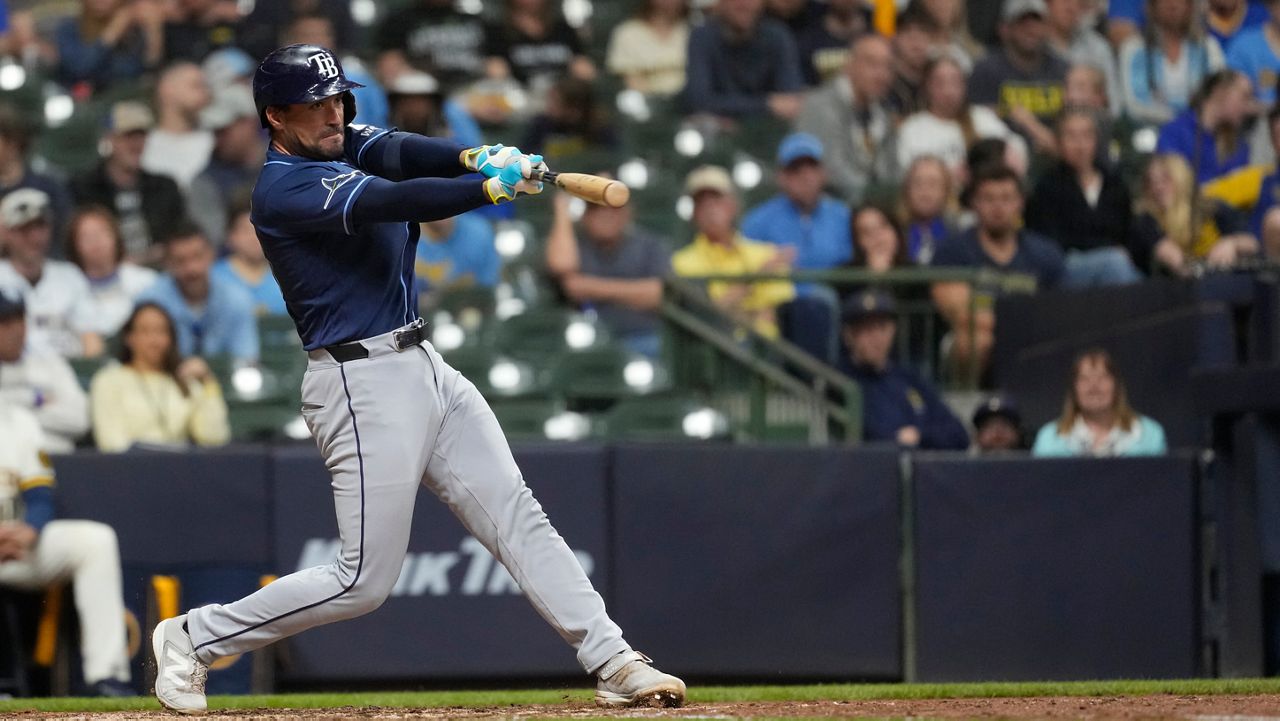 Tampa Bay Rays' Nick Fortes hits an RBI double during the ninth inning of a baseball game against the Milwaukee Brewers, Monday, March 30, 2026, in Milwaukee.