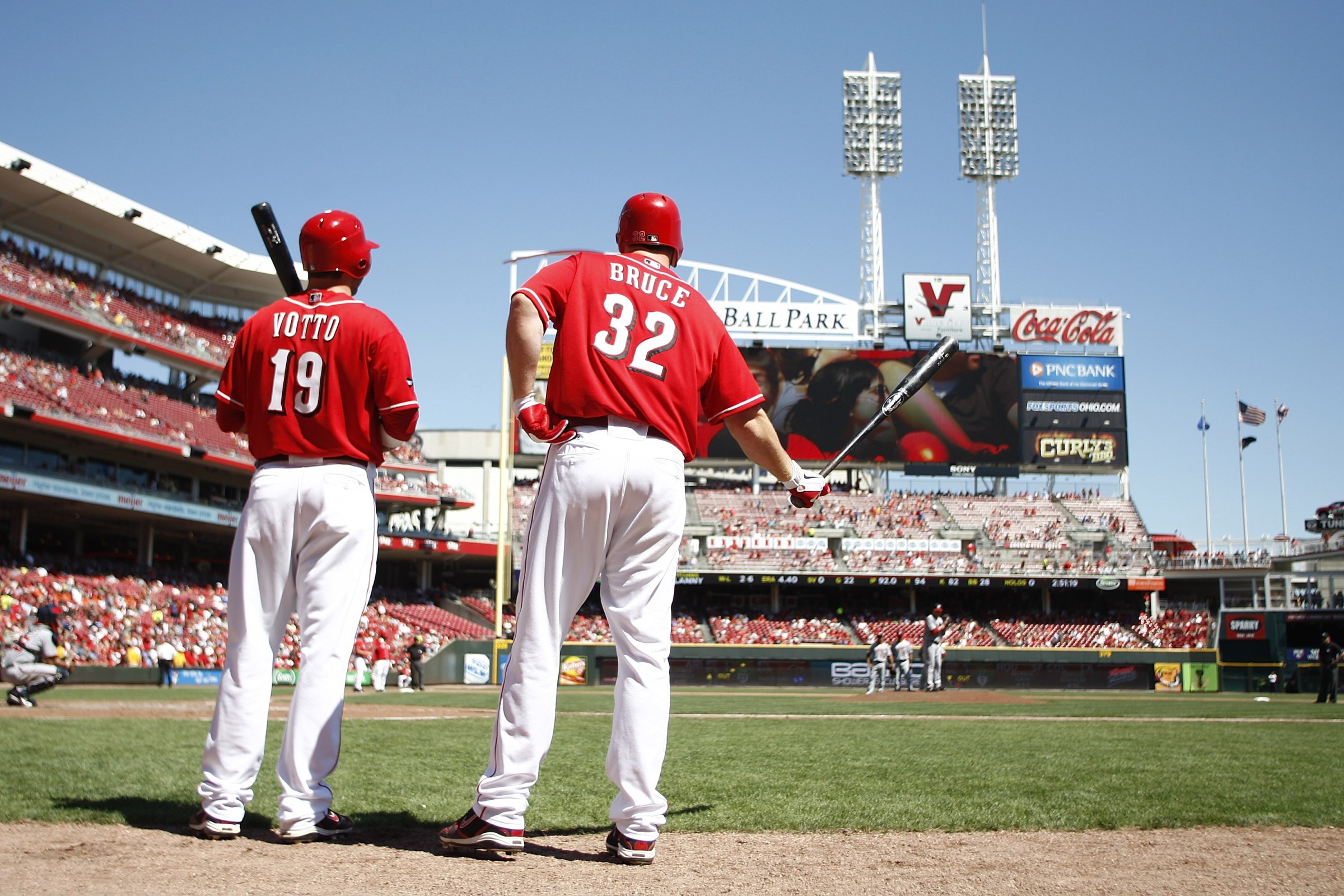 CINCINNATI, OH - AUGUST 28: Joey Votto #19 of the Cincinnati Reds and Jay Bruce #32 of the Cincinnati Reds wait in the on deck circle during their game against the Washington Nationals on August 28, 2011 at Great American Ball Park in Cincinnati, Ohio. The Reds defeated the Nationals 5-4 in 14 innings. (Photo by John Grieshop/Getty Images)