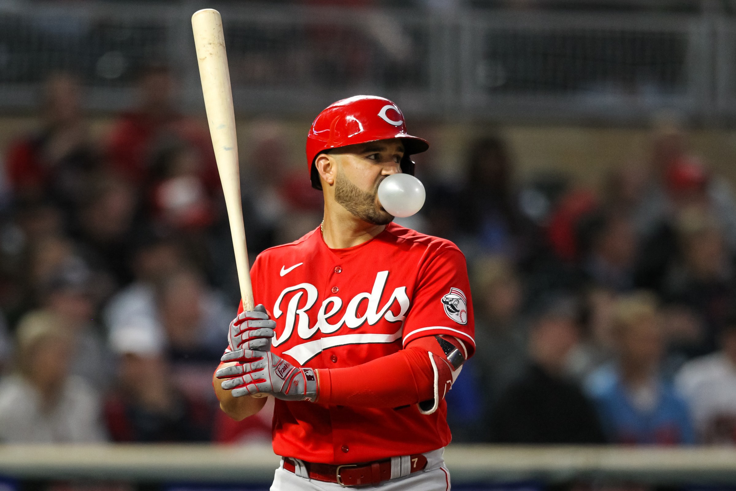 MINNEAPOLIS, MN - JUNE 21: Eugenio Suarez #7 of the Cincinnati Reds blows a bubble during his at bat against the Minnesota Twins in the fifth inning of the game at Target Field on June 21, 2021 in Minneapolis, Minnesota. The Twins defeated the Reds 7-5 in twelve innings. (Photo by David Berding/Getty Images)