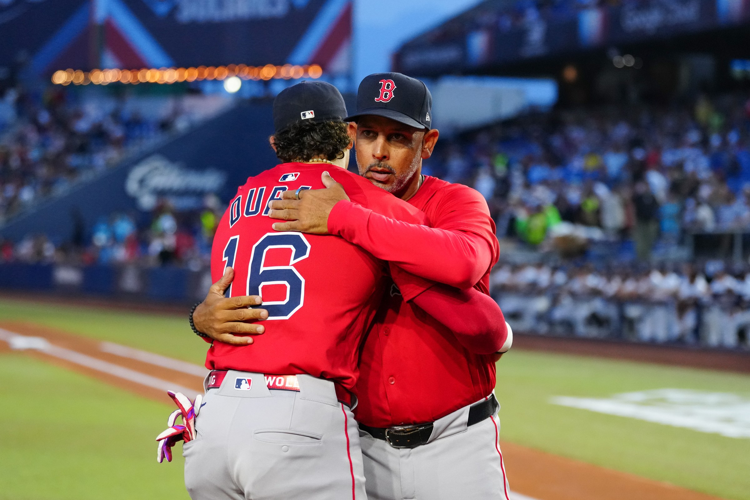 MONTERREY, MEXICO - MARCH 24: Jarren Duran #16 of the Boston Red Sox greets manager Alex Cora during player introductions prior to the game between the Boston Red Sox and the Sultanes de Monterrey at Estadio Mobil Super on Monday, March 24, 2025 in Monterrey, Mexico. (Photo by Mary DeCicco/MLB Photos via Getty Images)