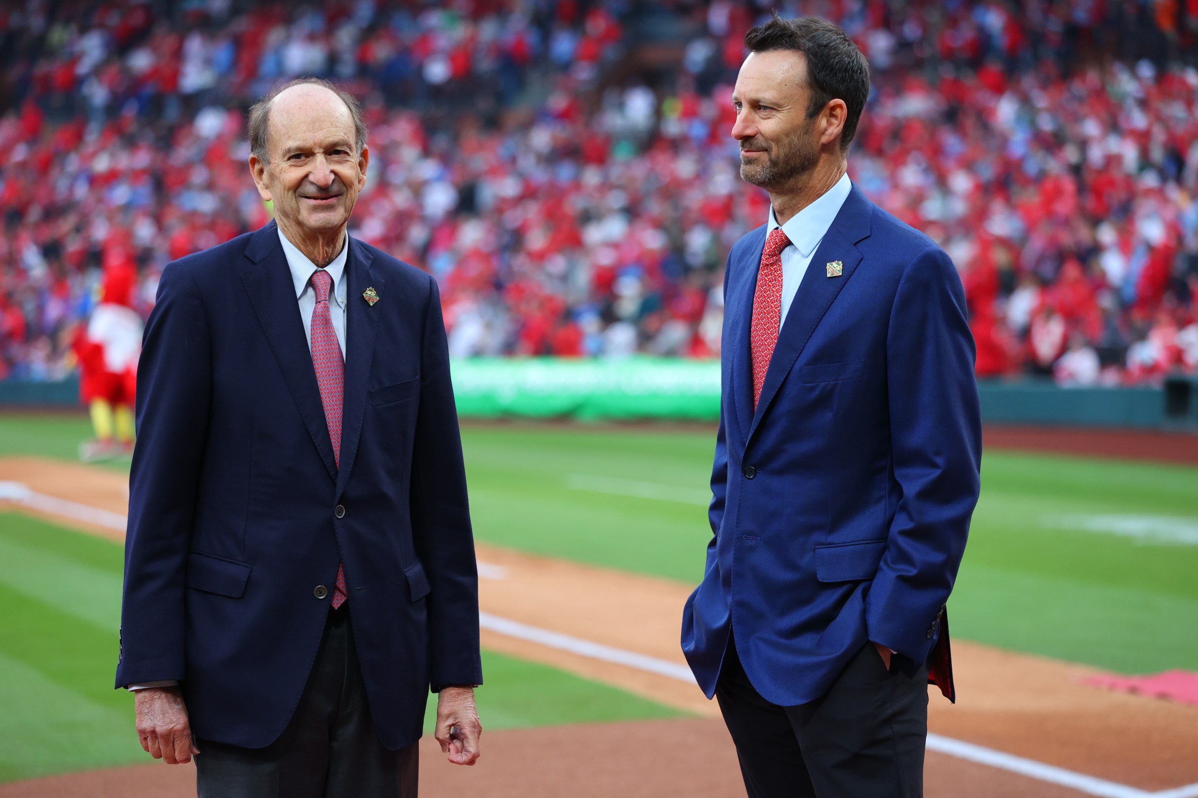 ST. LOUIS, MO - MARCH 27: St. Louis Cardinals Chairman & Chief Executive Officer Bill DeWitt Jr. talks with his son and Cardinals President William O. DeWitt III prior to the game between the Minnesota Twins and the St. Louis Cardinals at Busch Stadium on Thursday, March 27, 2025 in St. Louis, Missouri. (Photo by Dilip Vishwanat/MLB Photos via Getty Images)