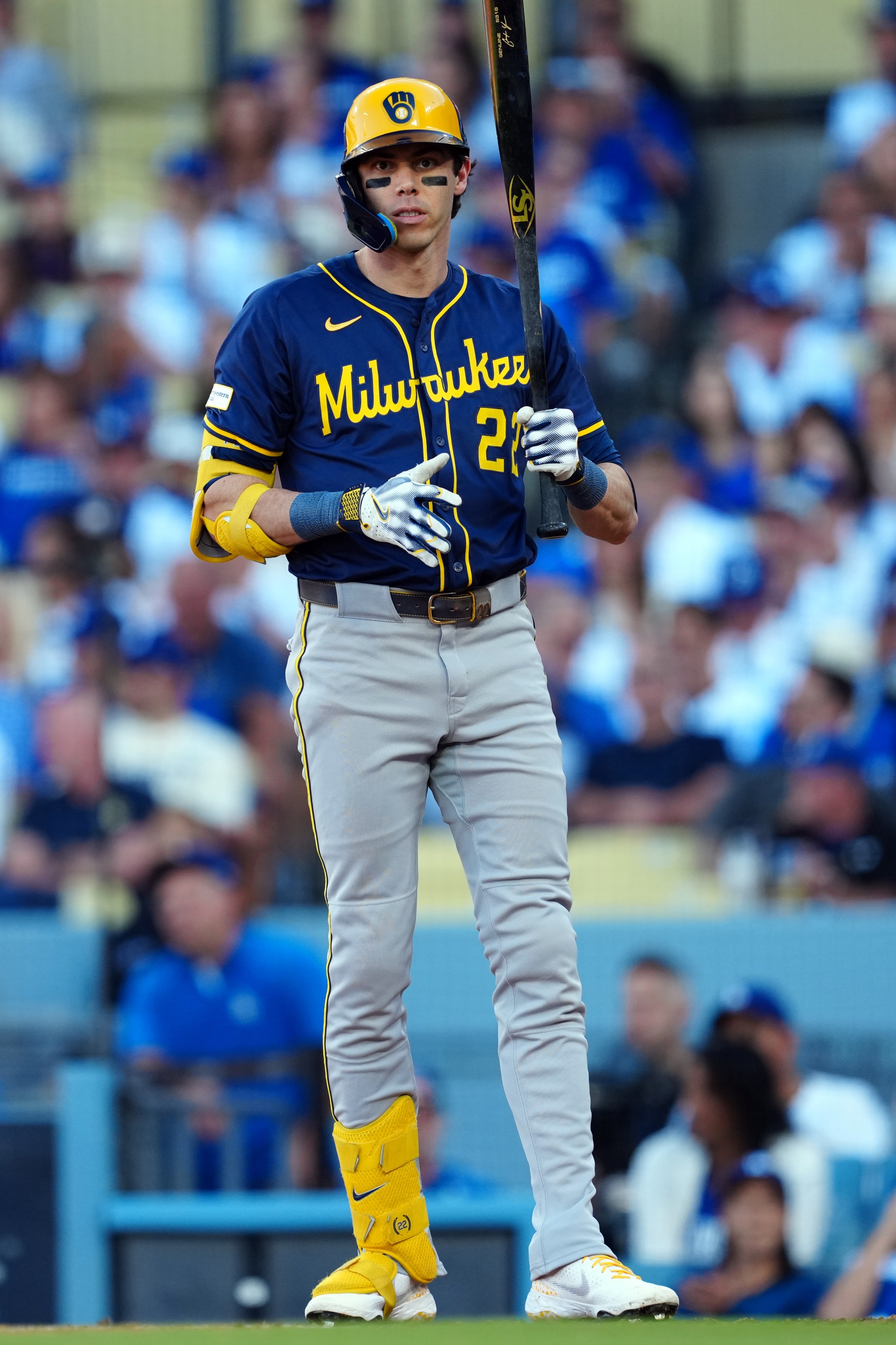 LOS ANGELES, CA - OCTOBER 16: Christian Yelich #22 of the Milwaukee Brewers looks on during Game Three of the National League Championship Series presented by loanDepot between the Milwaukee Brewers and the Los Angeles Dodgers at Dodger Stadium on Thursday, October 16, 2025 in Los Angeles, California. (Photo by Mary DeCicco/MLB Photos via Getty Images)