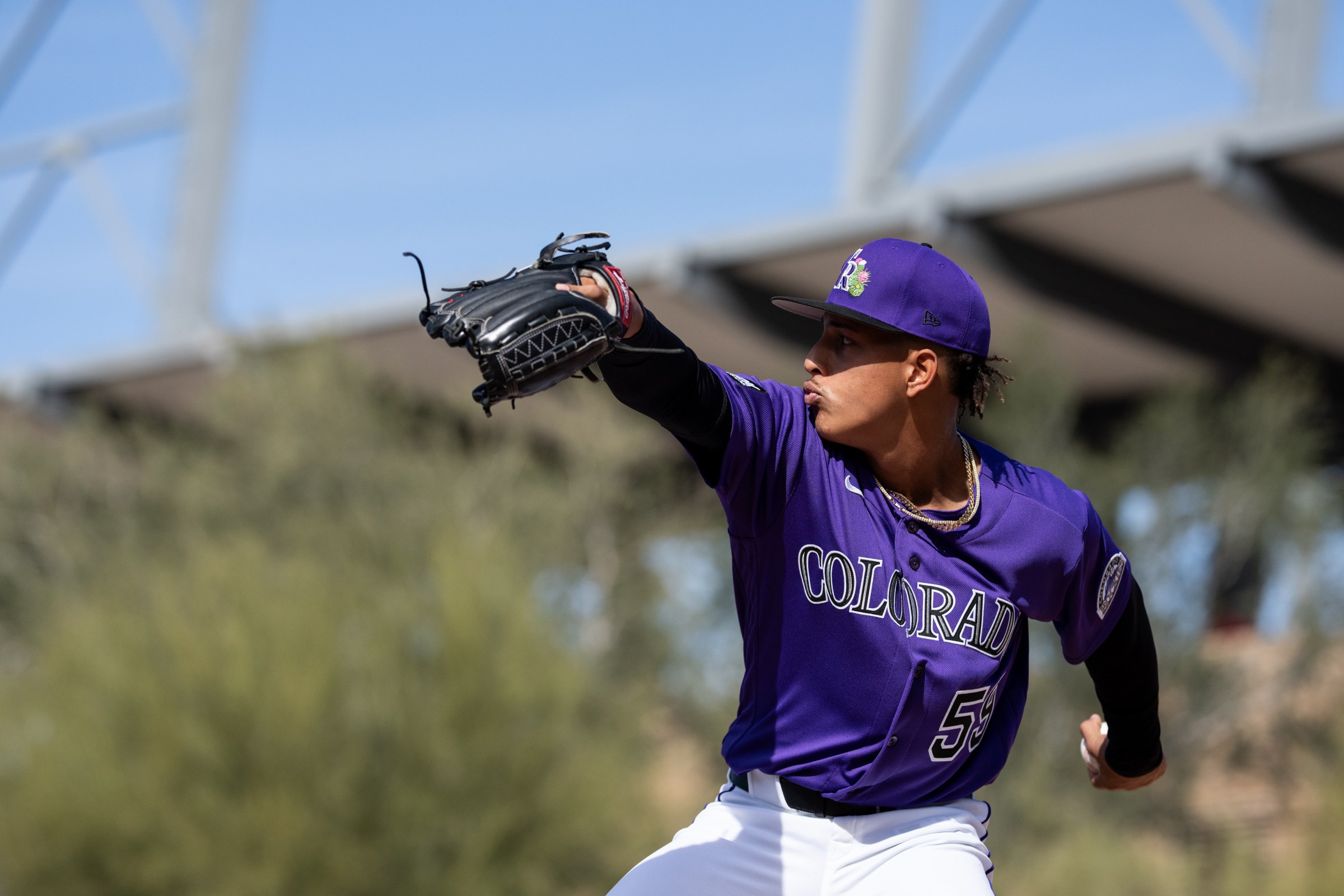 SCOTTSDALE, ARIZONA - FEBRUARY 12: Welinton Herrera #59 of the Colorado Rockies throws during his first bullpen of spring training at Salt River Fields at Talking Stick on February 12, 2026 in Scottsdale, Arizona. (Photo by Kyle Cooper/Colorado Rockies/Getty Images)