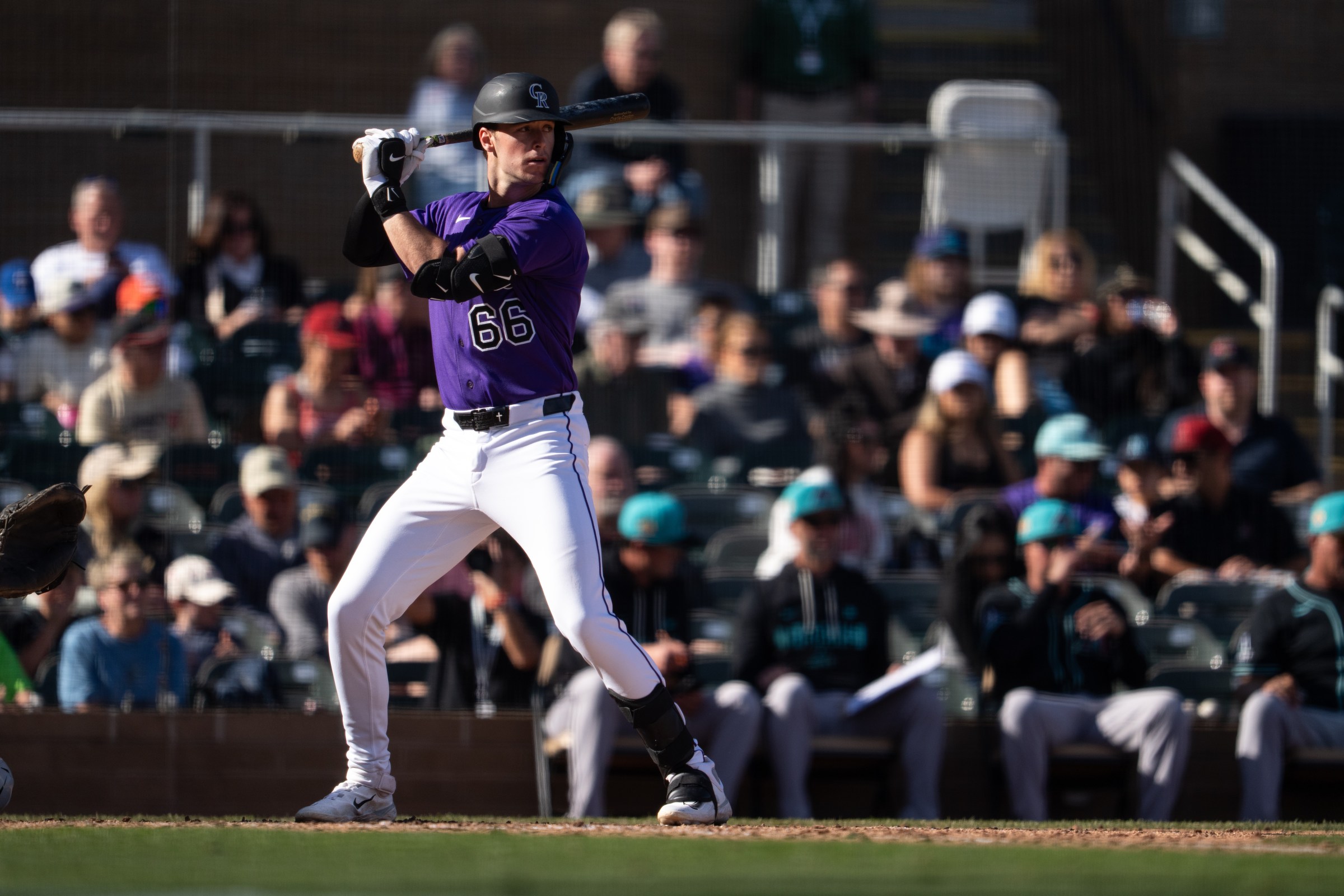 SCOTTSDALE, AZ - FEBRUARY 20: Charlie Condon #66 of the Colorado Rockies looks on during an at bat against the Arizona Diamondbacks at Salt River Fields on Friday, February 20, 2026 in Scottsdale, Arizona. (Photo by Kyle Cooper)