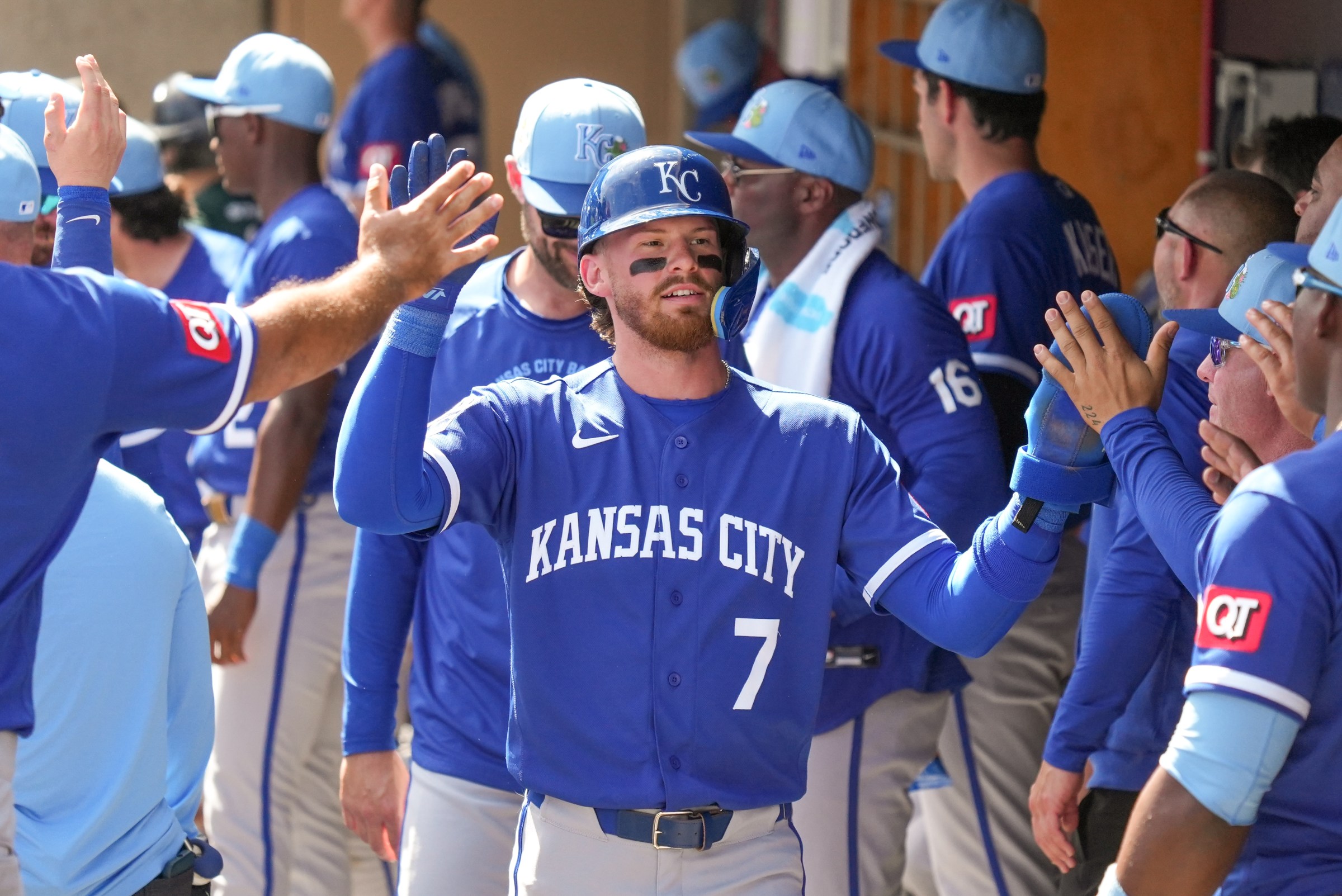 SCOTTSDALE, AZ - FEBRUARY 28: Bobby Witt Jr. #7 of the Kansas City Royals celebrates with teammates in the dugout during the game between the Kansas City Royals and the Colorado Rockies at Salt River Fields at Talking Stick on Saturday, February 28, 2026 in Scottsdale, Arizona. (Photo by Zach Gardner/MLB Photos via Getty Images)
