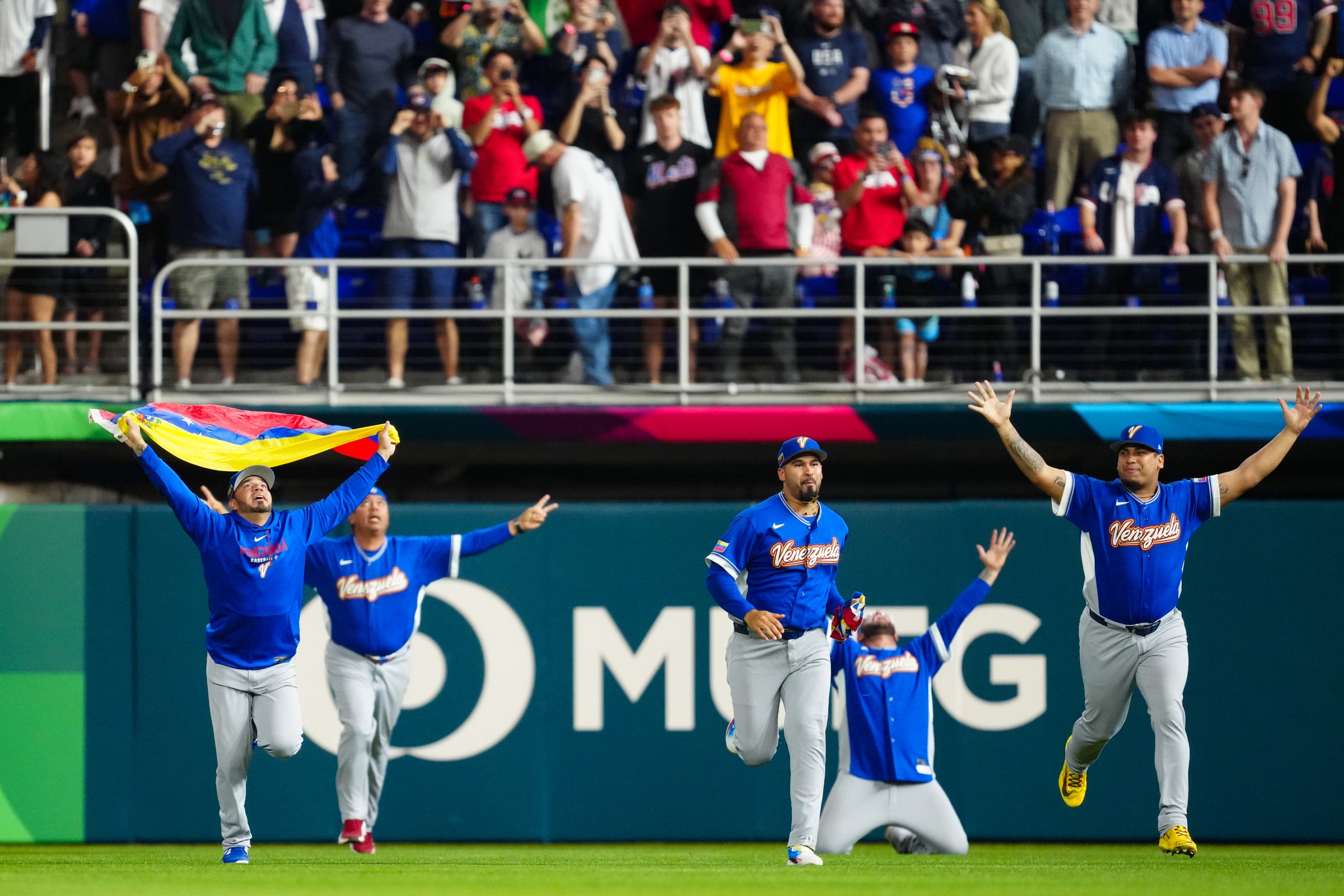 MIAMI, FL - MARCH 17: Members of Team Venezuela’s bullpen run onto the field to celebrate after the final out during the 2026 World Baseball Classic Championship game presented by Capital One between Team Venezuela and Team USA at loanDepot Park on Tuesday, March 17, 2026 in Miami, Florida. (Photo by Mary DeCicco/WBCI/MLB Photos via Getty Images)