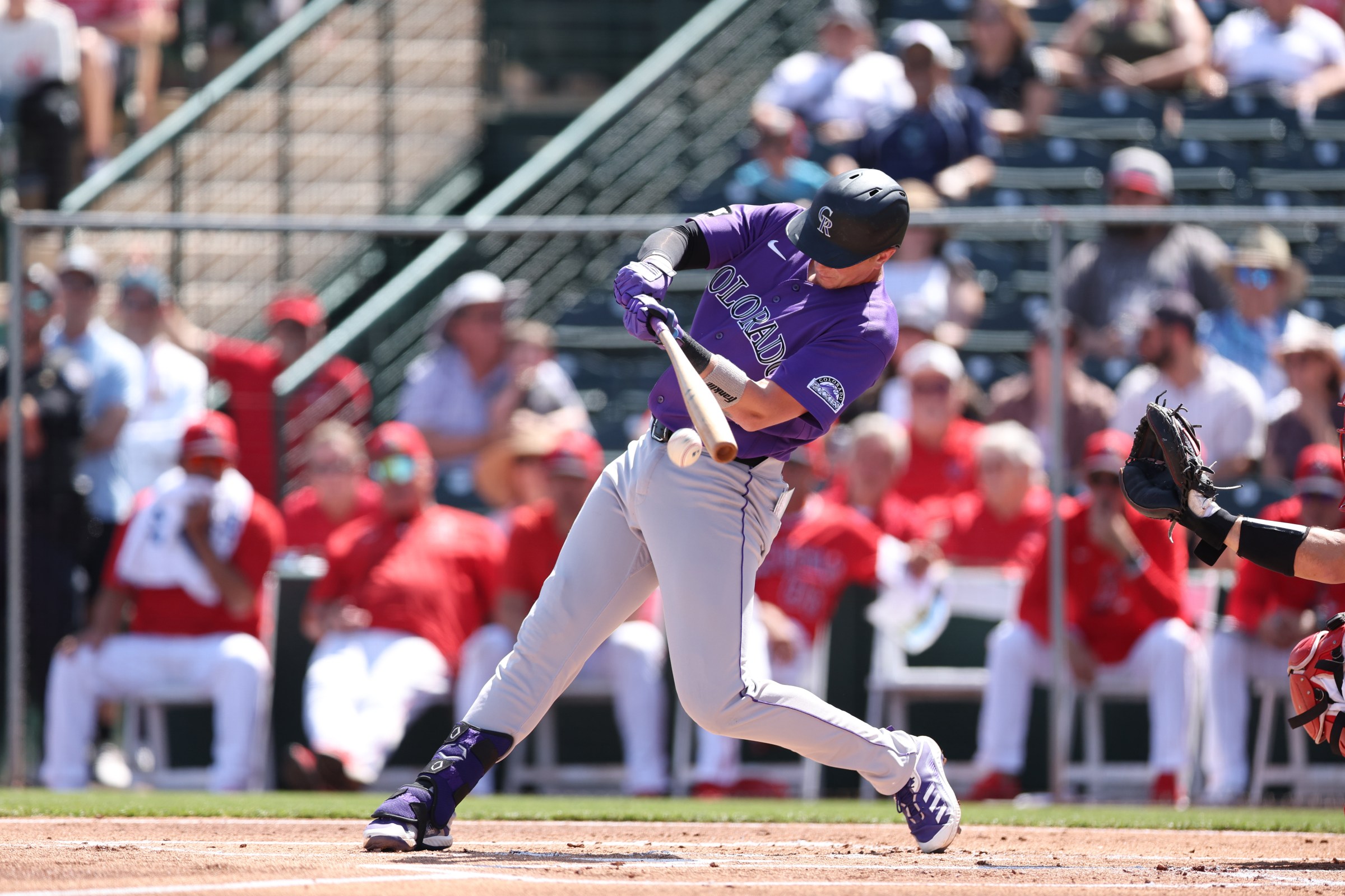 TEMPE, ARIZONA - MARCH 15: TJ Rumfield #64 of the Colorado Rockies bats during the first inning of the spring training game against the Los Angeles Angels at Tempe Diablo Stadium on March 15, 2026 in Tempe, Arizona. (Photo by Jeremy Chen/Getty Images)
